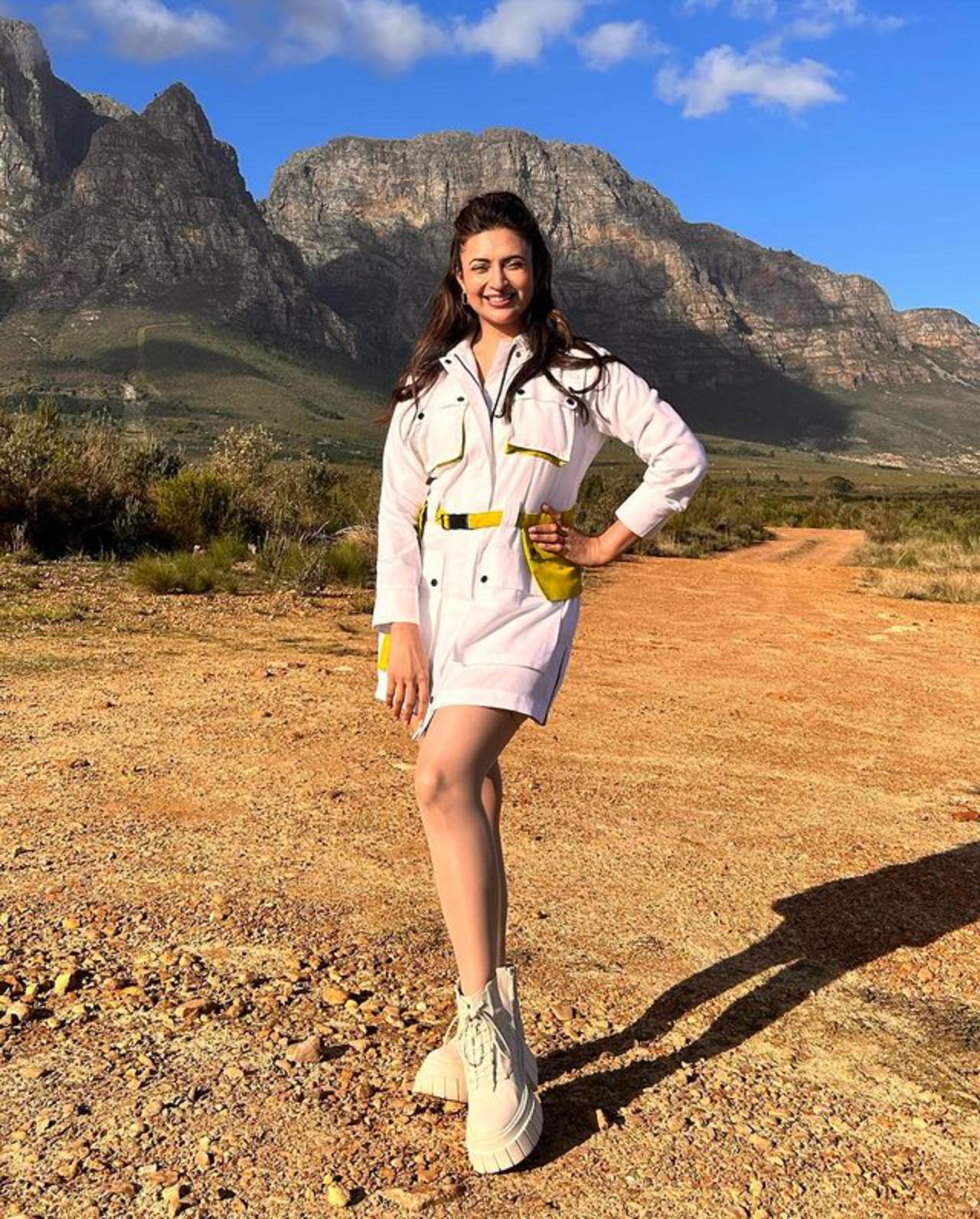 Divyanka Tripathi rocked a white one-piece paired with a vibrant yellow belt 
